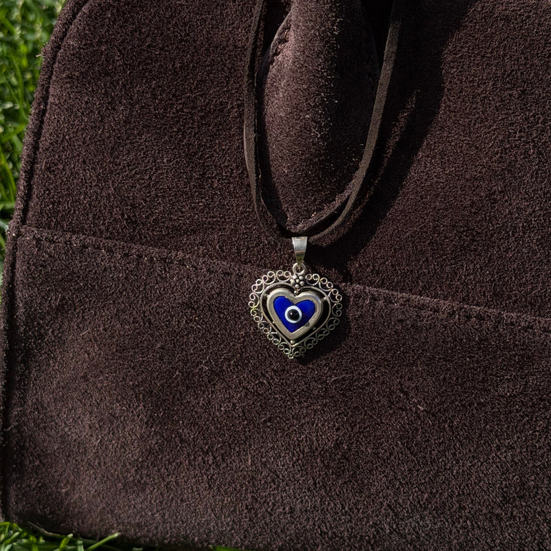 Sterling silver filigree heart pendant with blue evil eye – photo 3