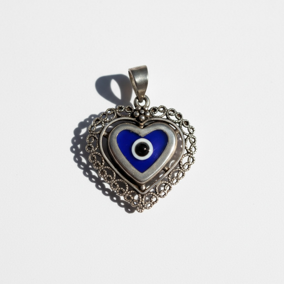 Sterling silver filigree heart pendant with blue evil eye – photo 2