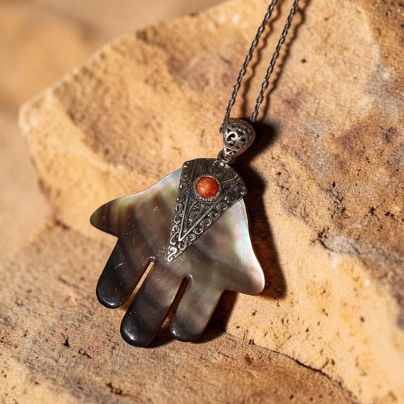 Mother-of-pearl Hamsa pendant with sterling silver accent and coral-colored stone – photo 2
